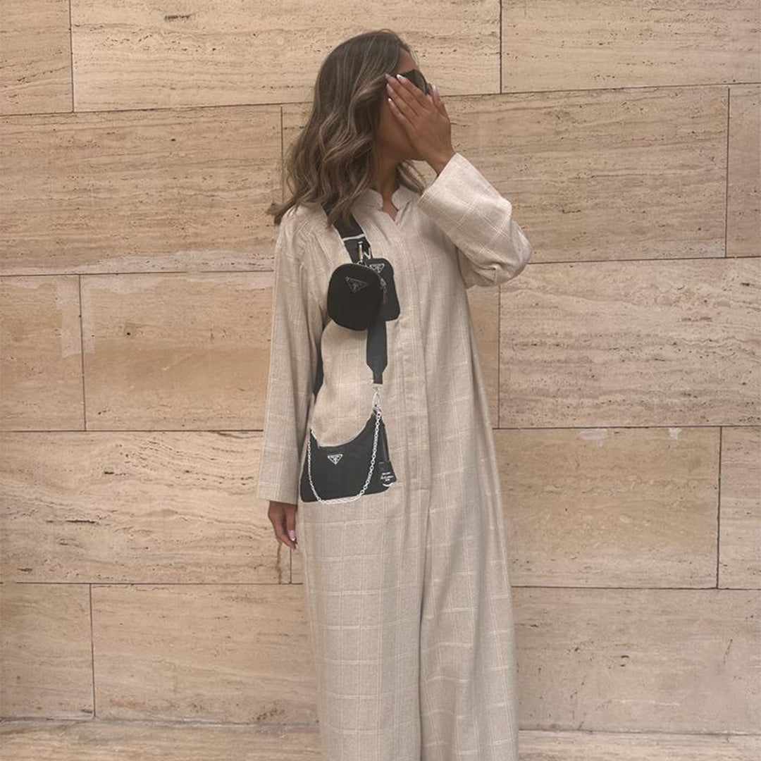 Stylish long sleeves jumpsuit with black bag print